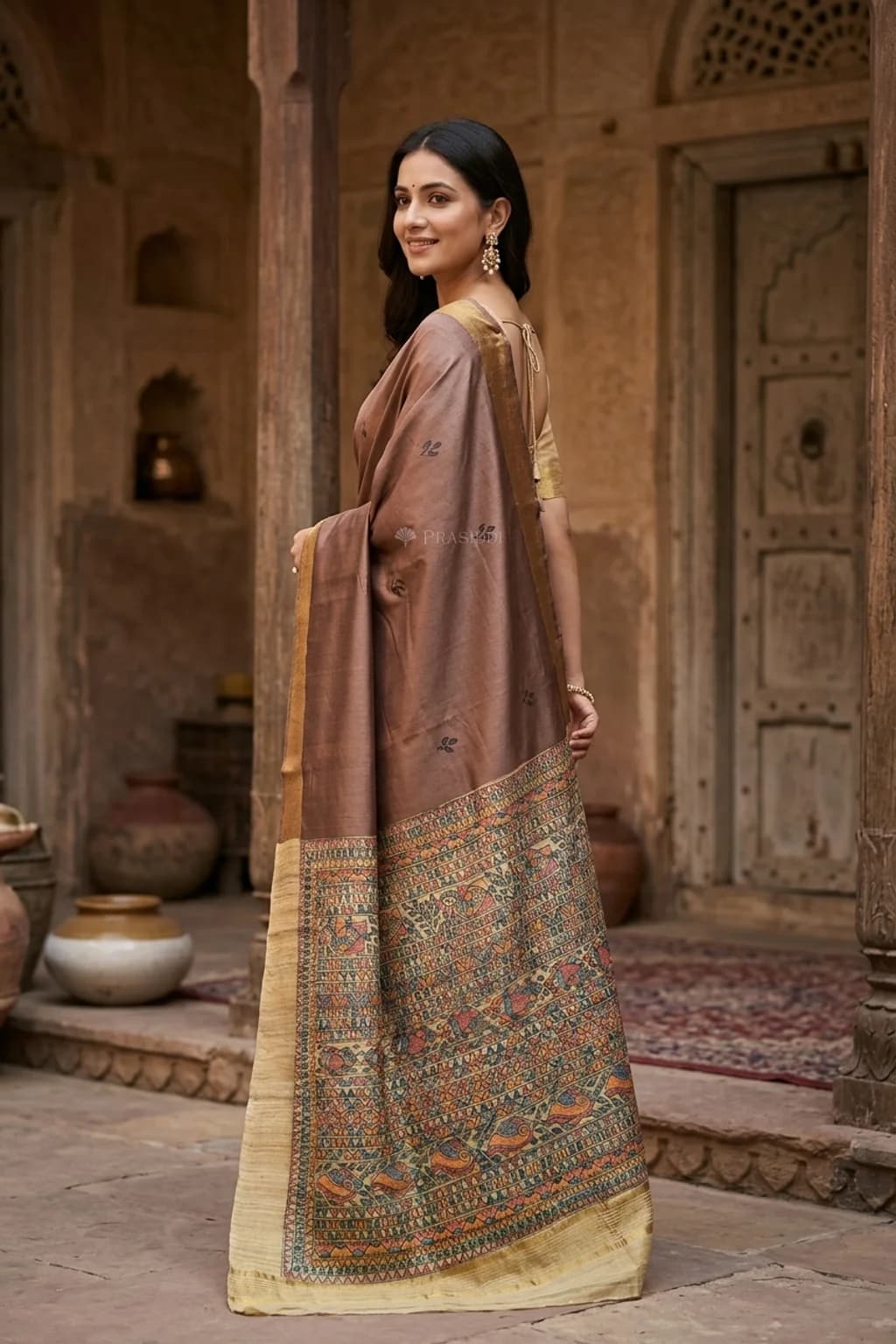 Brown Printed Tussar Silk Saree with Madhubanni Print and Tissue Border – Model Displaying Full Saree