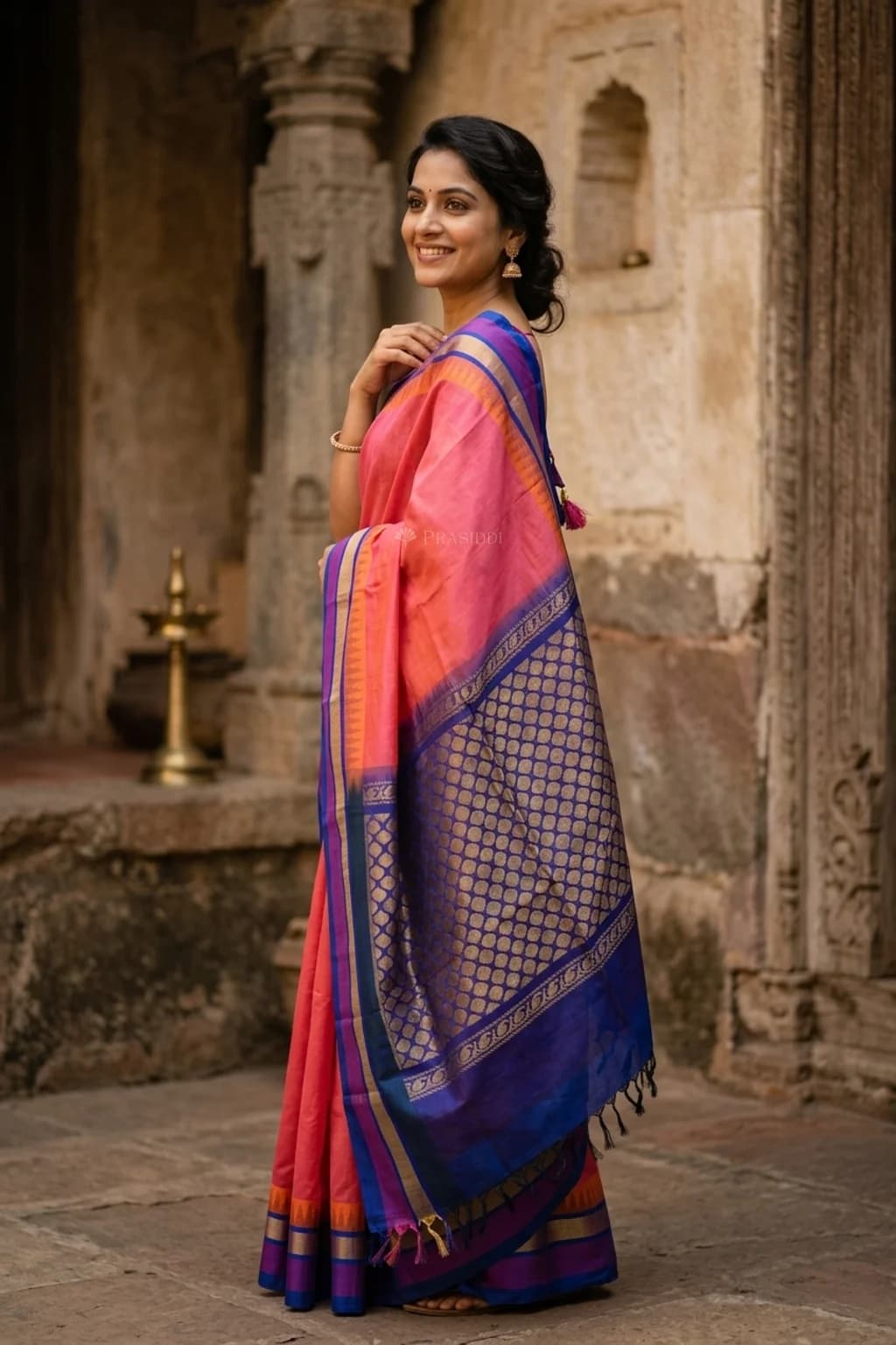 Pink Pattur Silk Cotton Saree with a dark blue temple border – Model Displaying Full Saree