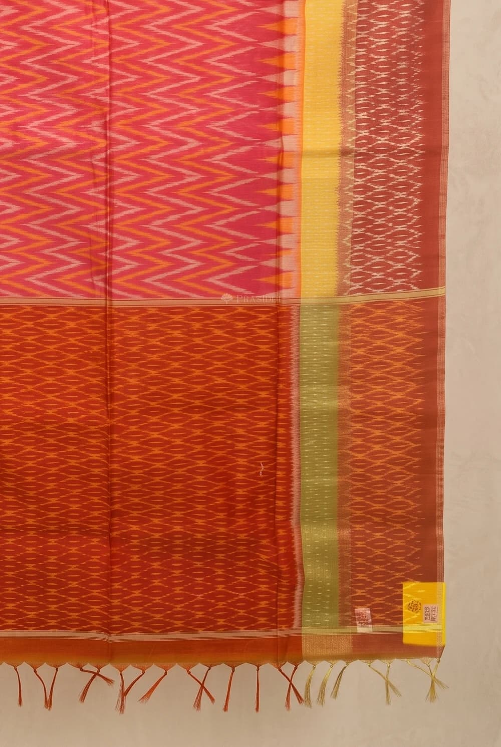 Orangish Rust Silk Cotton Saree with a Brown Contrast Border and Pinkish Rust Pallu. – Display Image