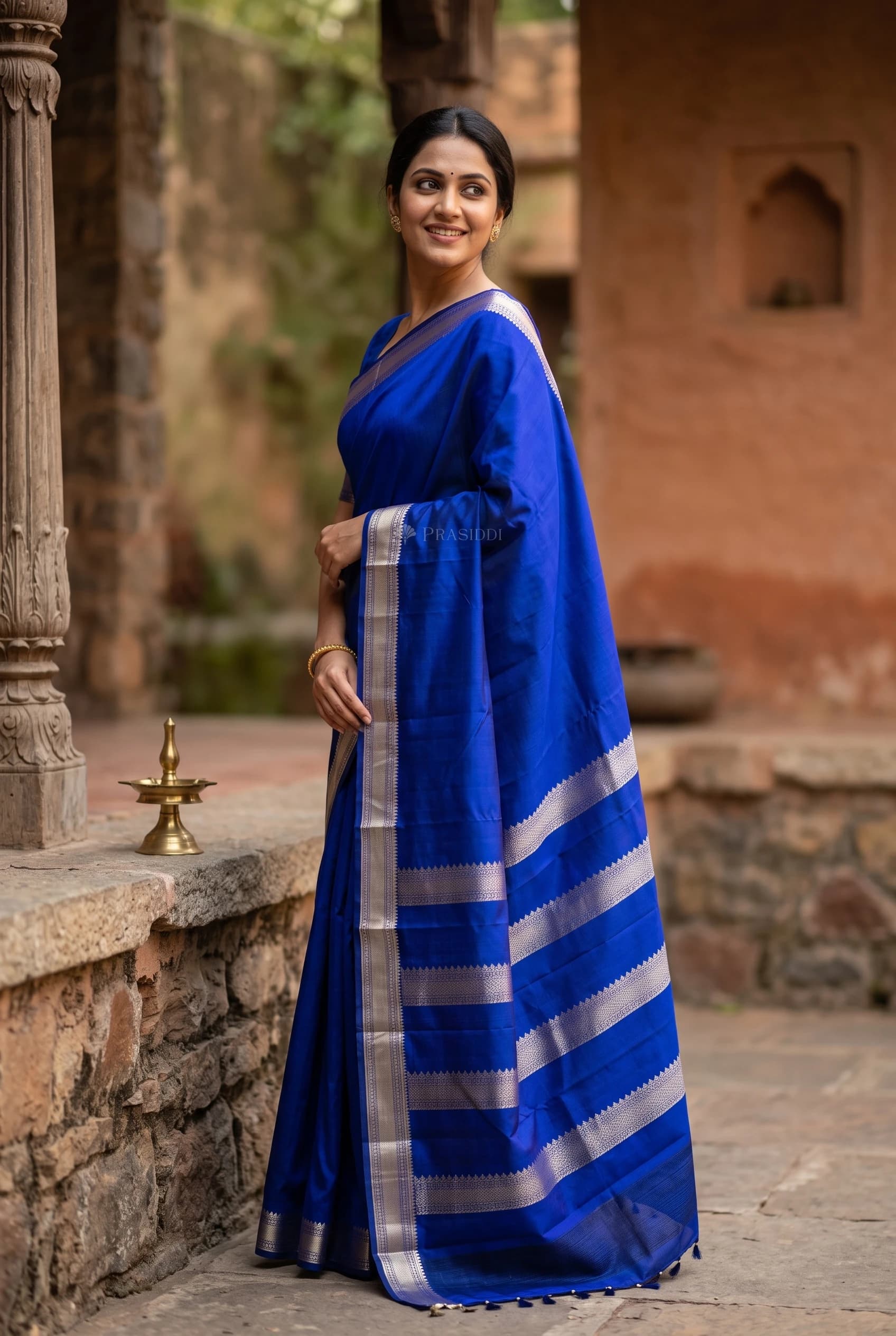 Royal Blue Silk Saree with a Classical Border, Ideal for Festive Occasions. – Model Displaying Full Saree