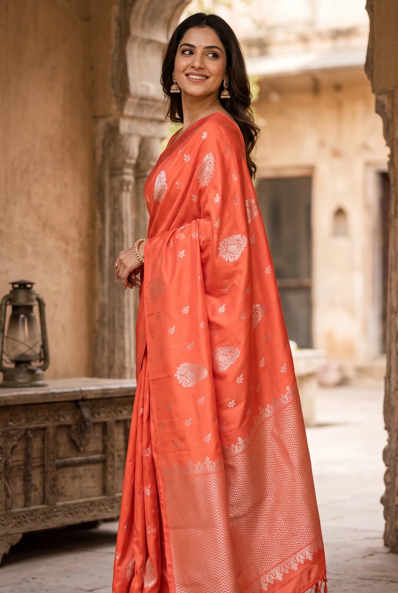 Reddish Orange Traditional Silk Saree with Woven Traditional Motifs and a Soft Drape – Display Image