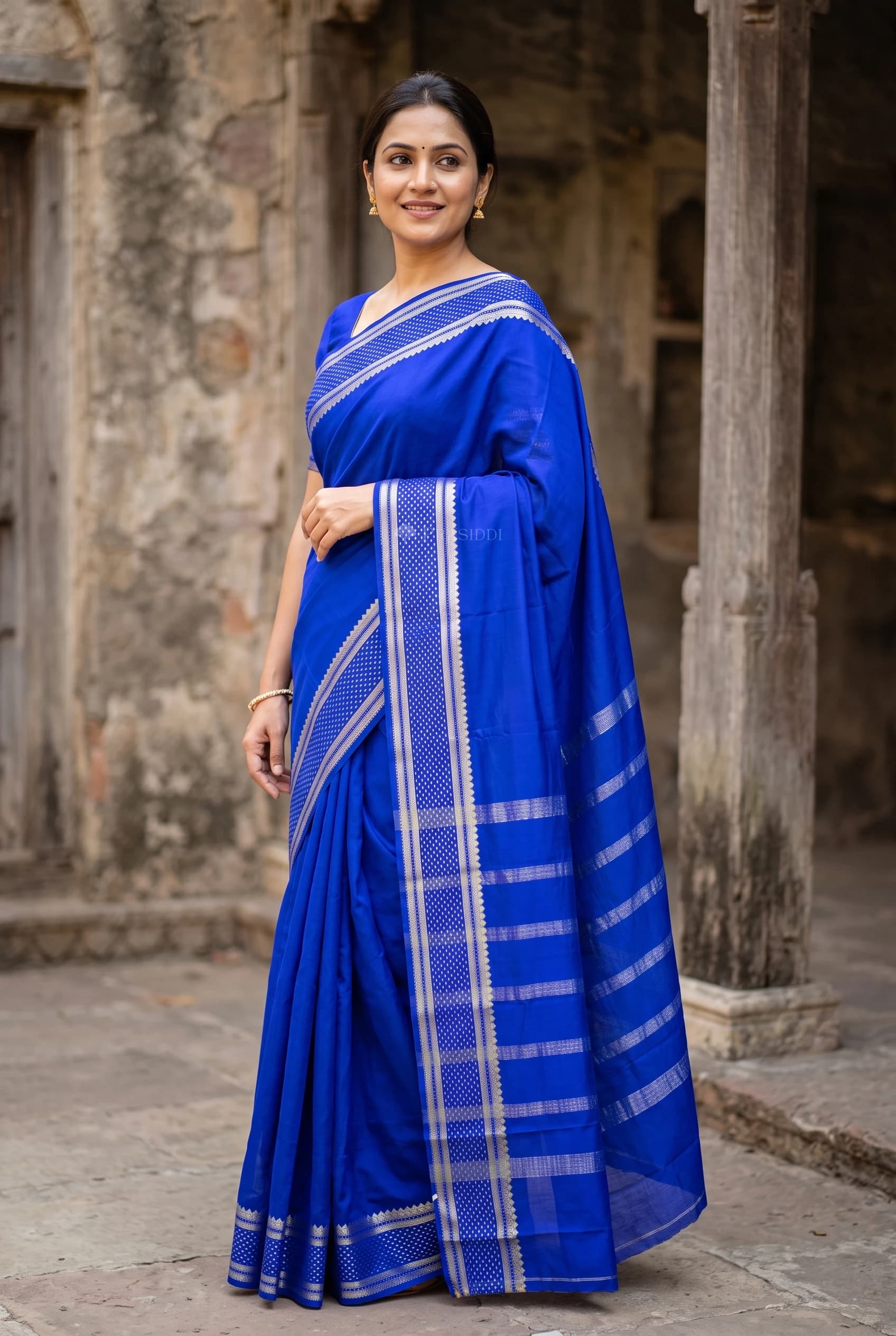 Royal Blue Mysore Silk Saree with Classical Border and Woven Design. – Model Displaying Full Saree