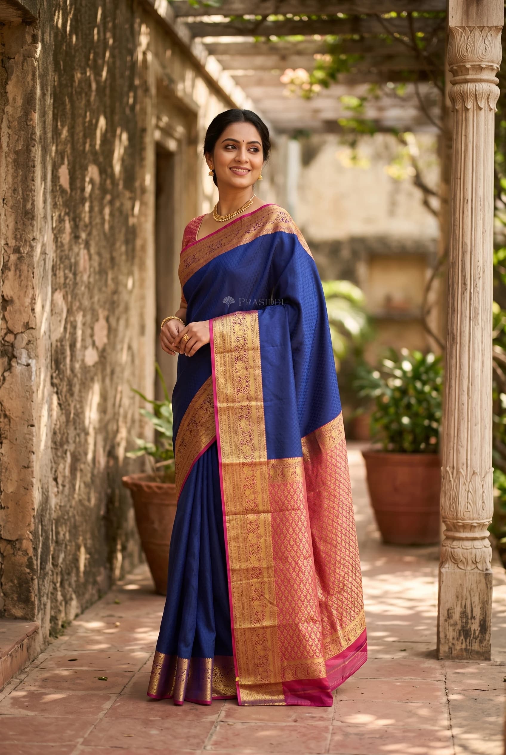 Royal Blue & Pinkish Orange Silk Saree with Woven Work and Contrast Border – Model Displaying Full Saree