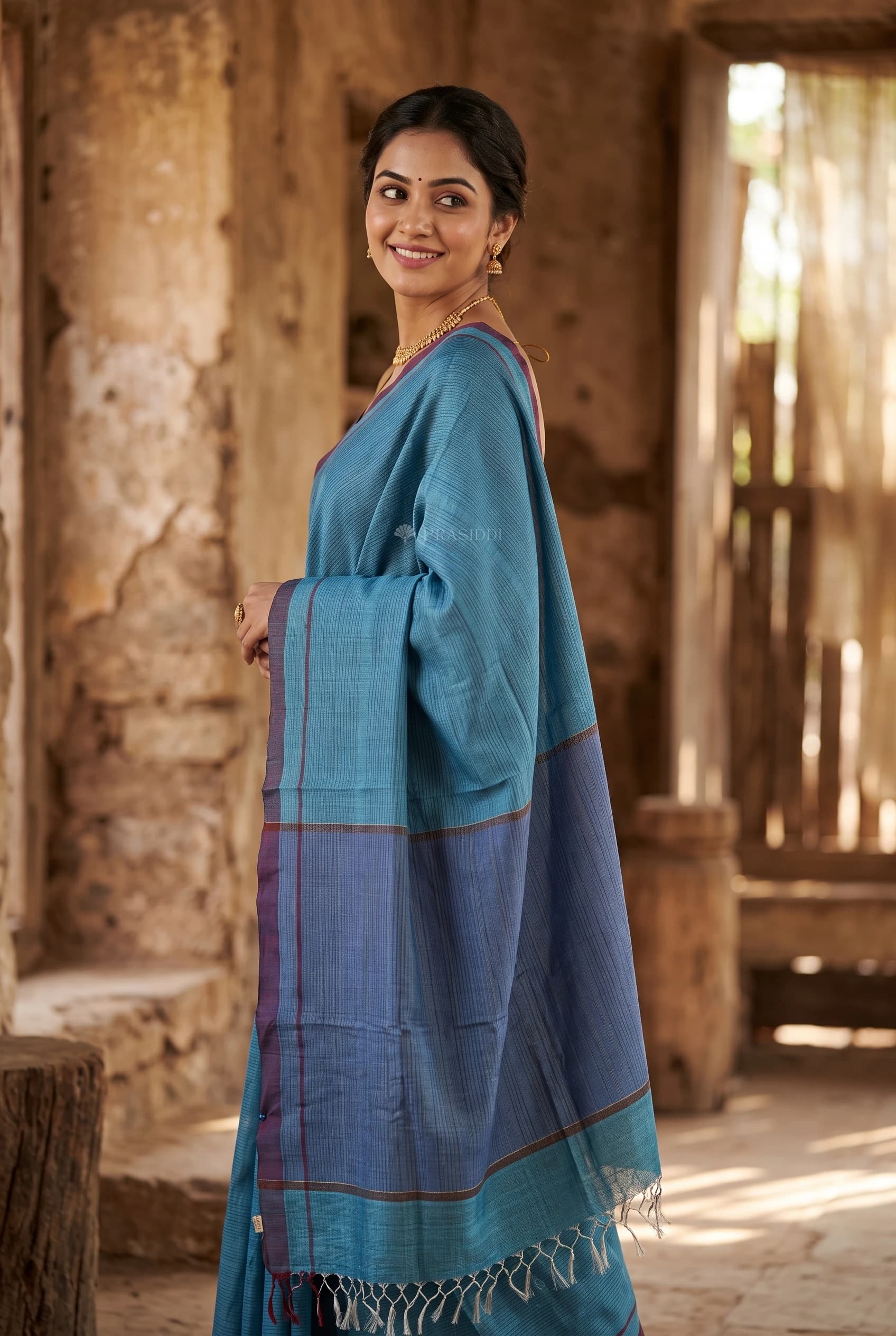 Royal Blue Tussar Silk Saree with Contrast Border, Ideal for Festive Occasions. – Model Displaying Full Saree